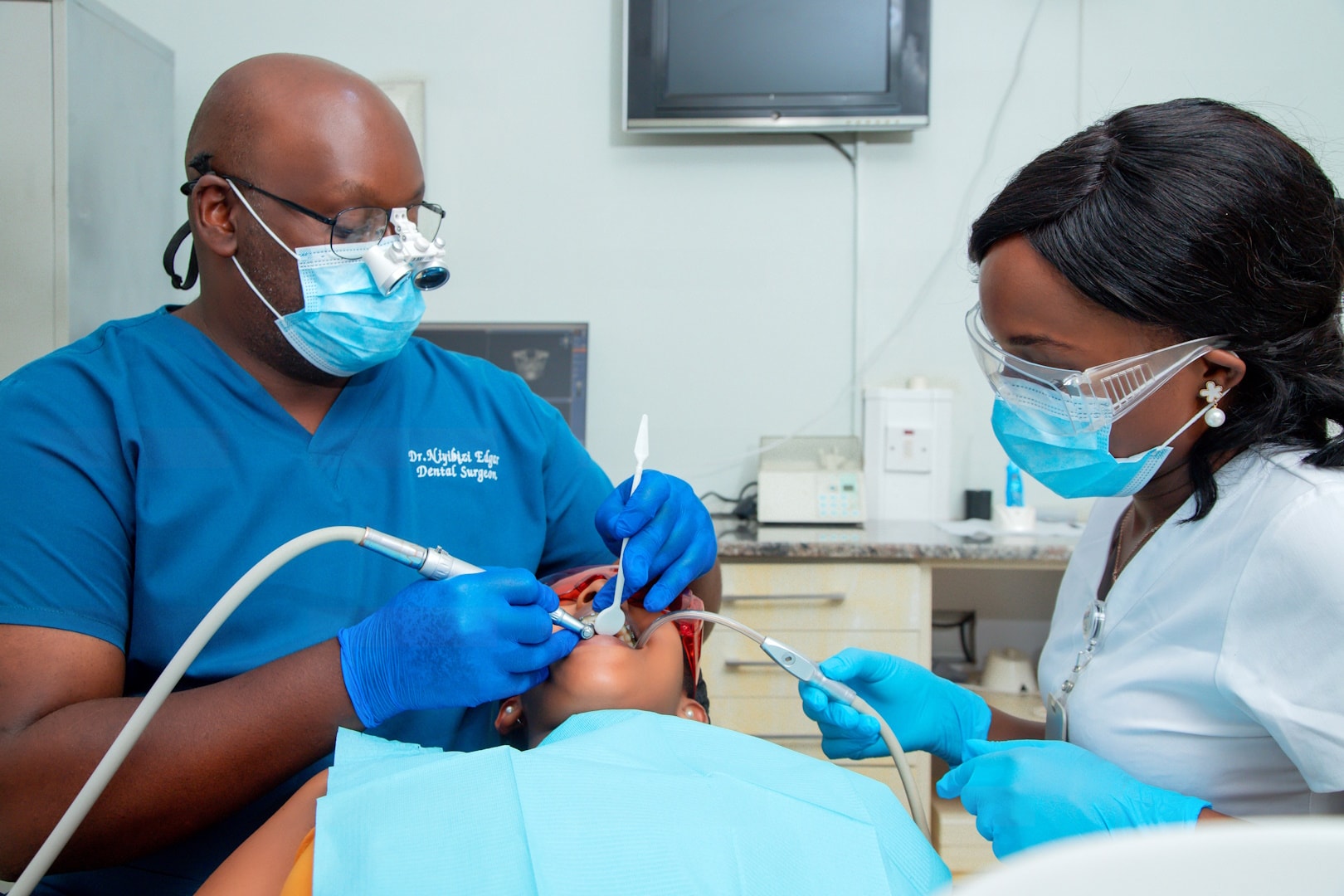 Dentist and dental assistant treating a patient at Donau Dental Center